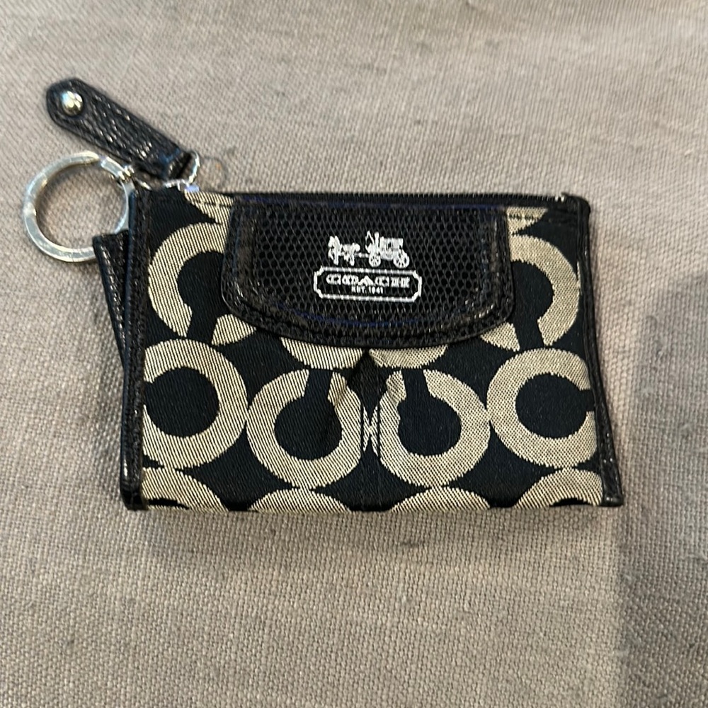 Coach change/card holder pouch with pocket and keychain.